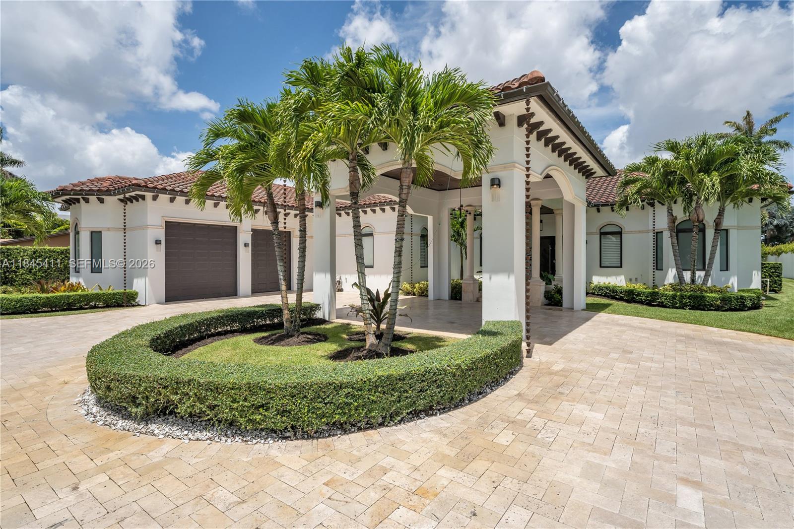 331 Southwest 124th Avenue Miami, FL 33184 - Photo 65 of 69 a front view of a house with garden