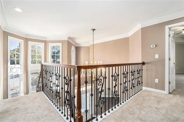 a view of a hallway with windows