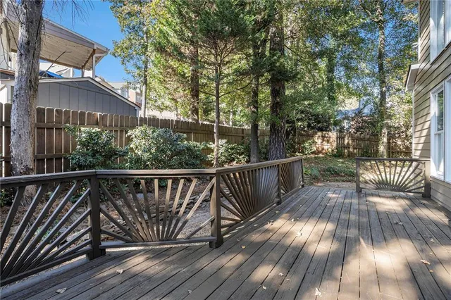 a view of balcony with wooden floor
