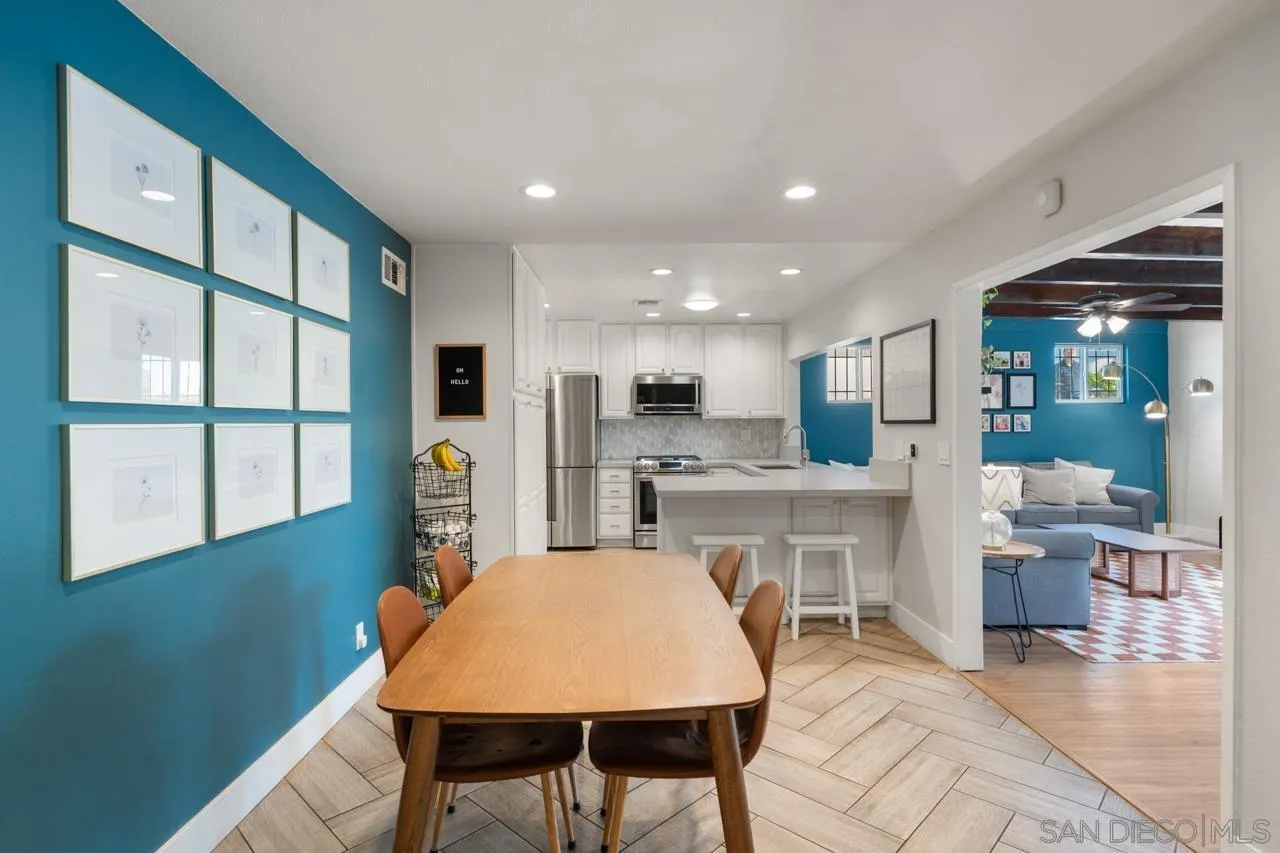10113 Gem Tree Way Santee, CA 92071 - Photo 14 of 49 a large kitchen with a table and chairs