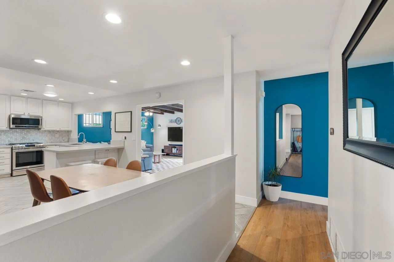 10113 Gem Tree Way Santee, CA 92071 - Photo 16 of 49 a kitchen with stainless steel appliances granite countertop a refrigerator and a sink