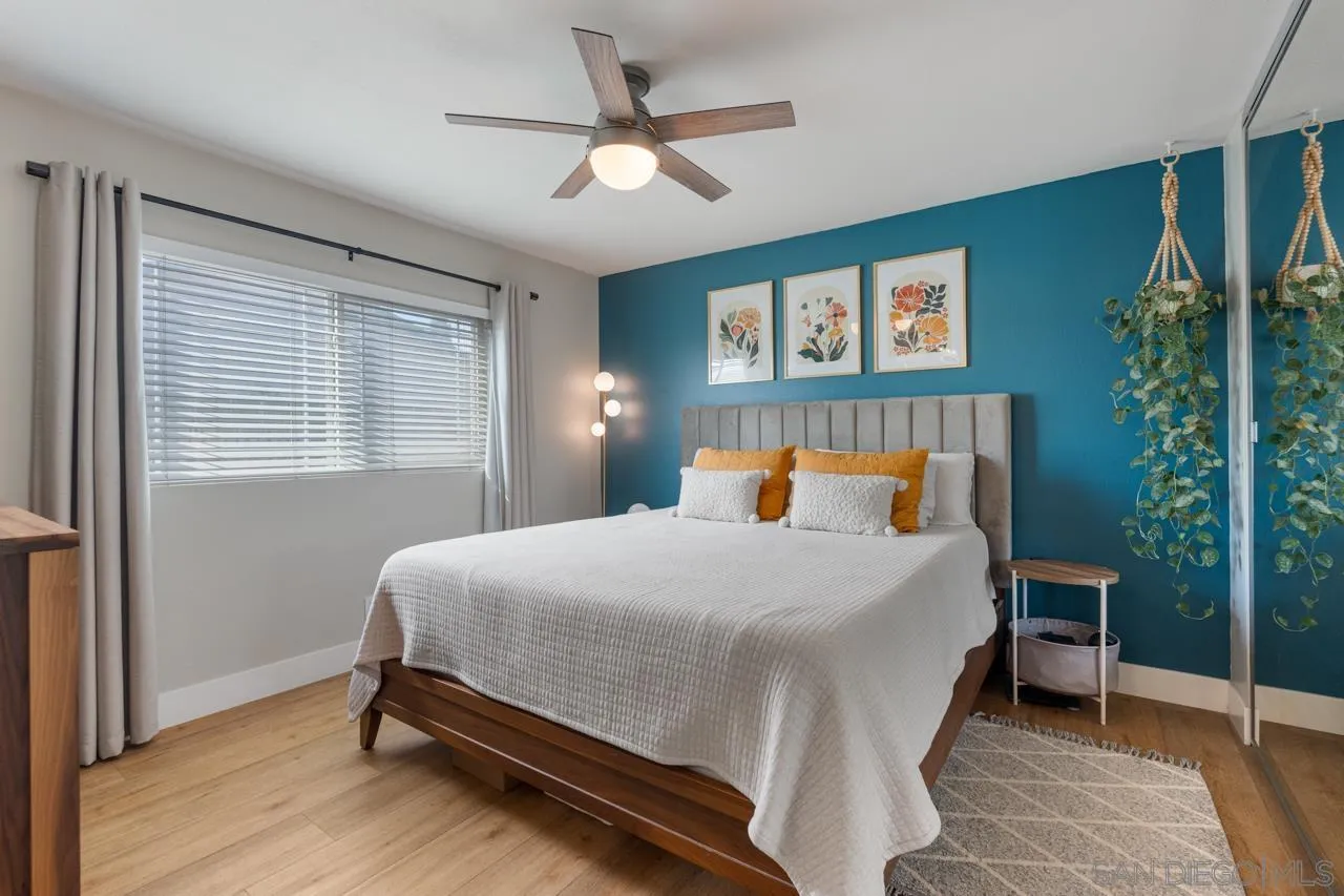 10113 Gem Tree Way Santee, CA 92071 - Photo 23 of 49 a bedroom with a bed and a window