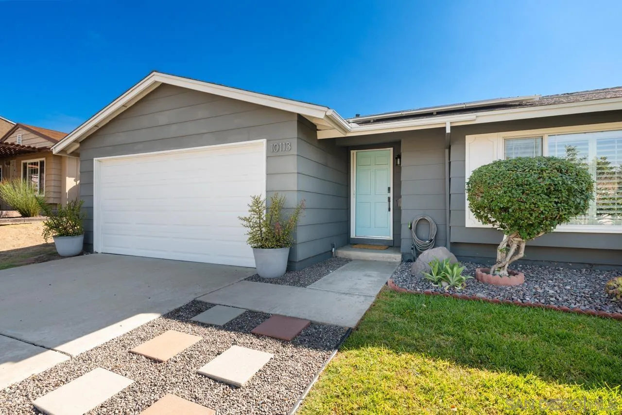 10113 Gem Tree Way Santee, CA 92071 - Photo 3 of 49 a front view of a house with garden