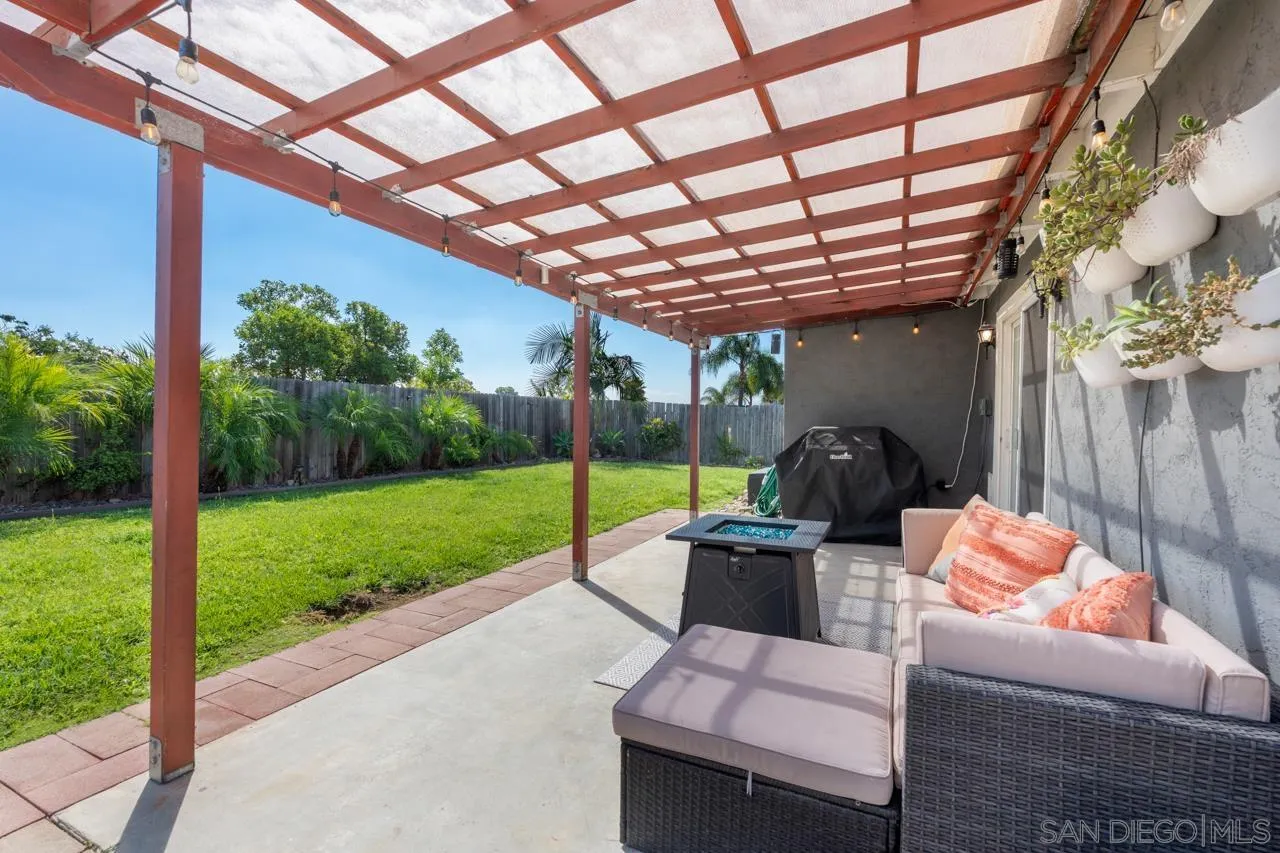 10113 Gem Tree Way Santee, CA 92071 - Photo 35 of 49 a outdoor living space with furniture and garden