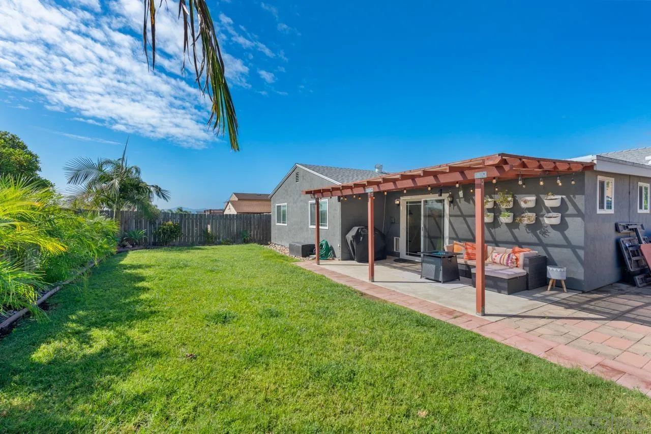 10113 Gem Tree Way Santee, CA 92071 - Photo 37 of 49 a view of a house with a yard and sitting area