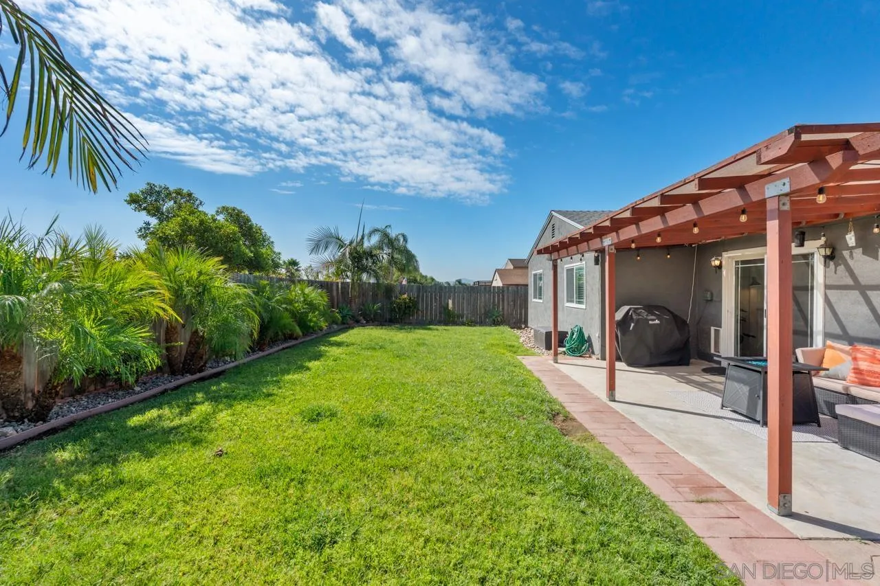 10113 Gem Tree Way Santee, CA 92071 - Photo 38 of 49 a porch with yard and outdoor seating