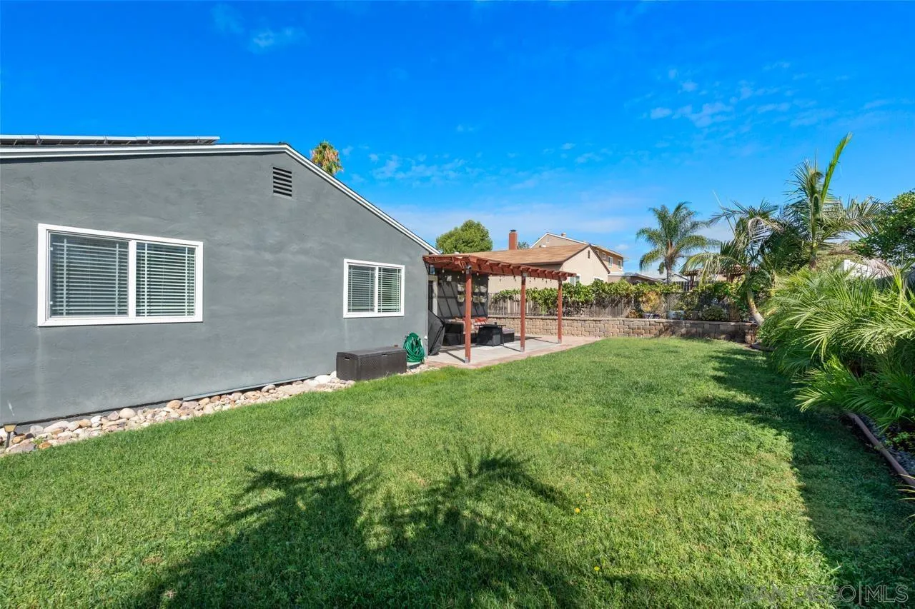 10113 Gem Tree Way Santee, CA 92071 - Photo 41 of 49 a view of a house with a backyard