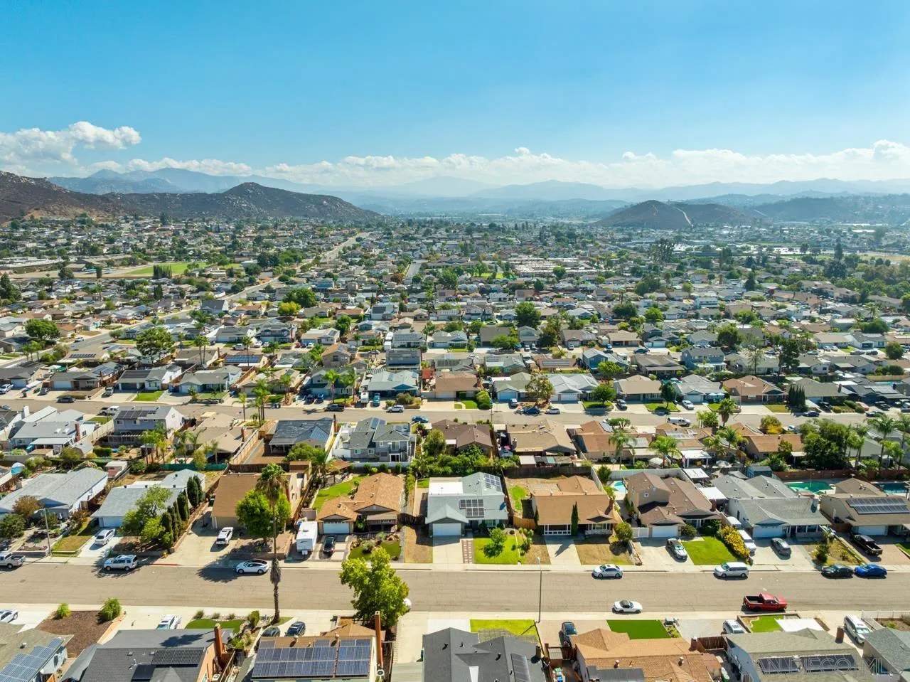 10113 Gem Tree Way Santee, CA 92071 - Photo 43 of 49 an aerial view of residential building with green space