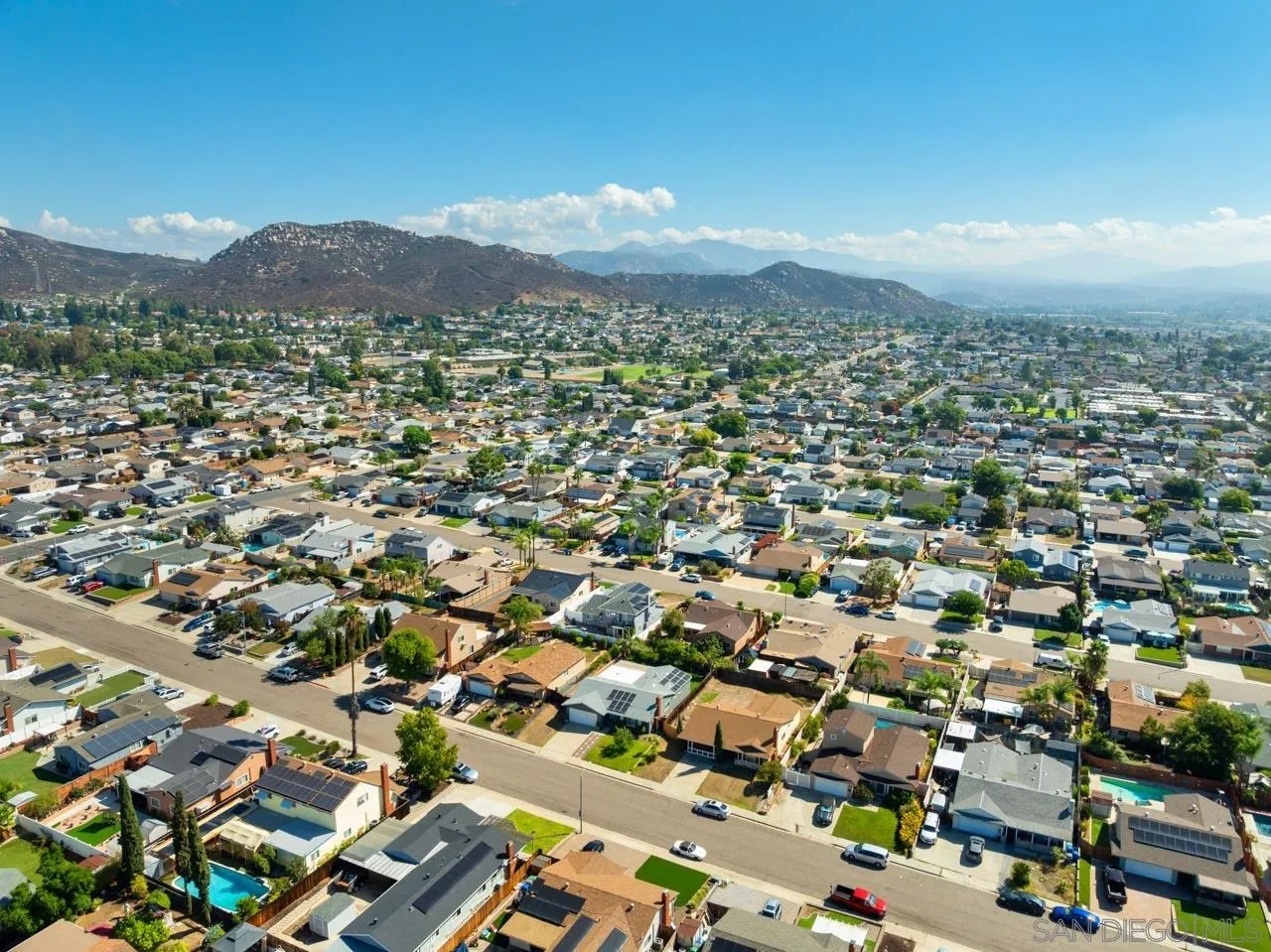 10113 Gem Tree Way Santee, CA 92071 - Photo 44 of 49 an aerial view of residential houses with a city street