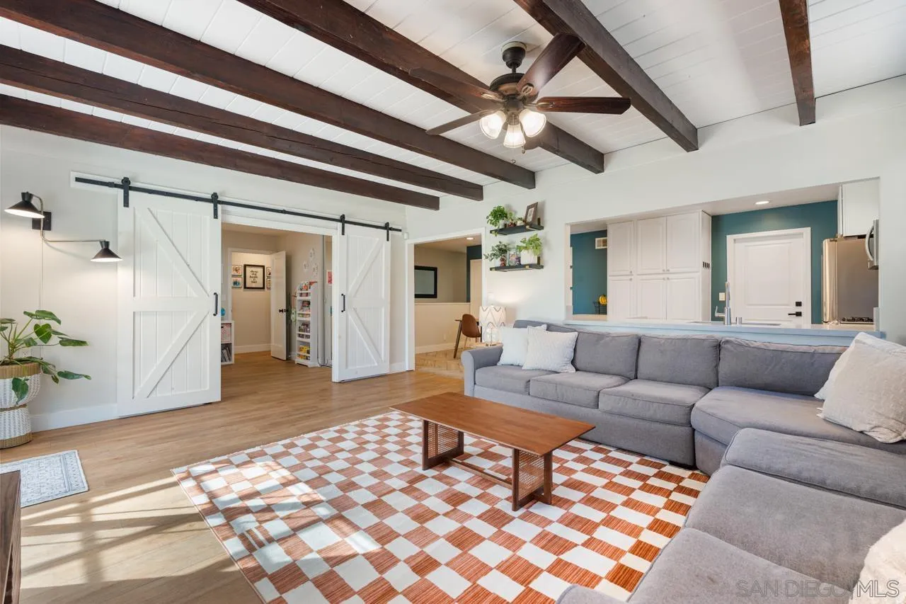 10113 Gem Tree Way Santee, CA 92071 - Photo 10 of 49 a living room with furniture and a rug