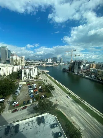 a view of a lake with a yard