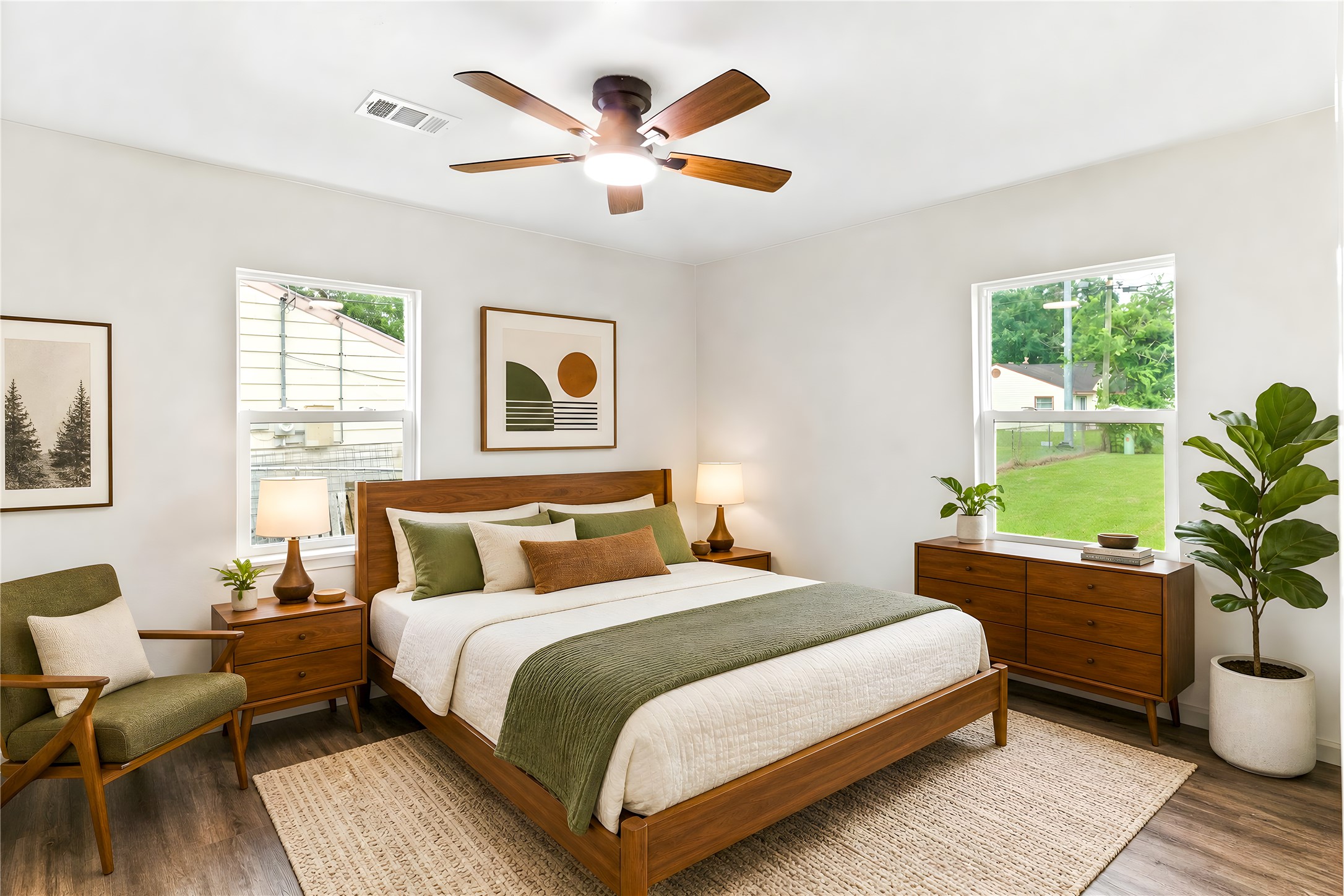 1108 Nottingham Drive Angleton, TX 77515 - Photo 14 of 23 a bedroom with a bed and a potted plant