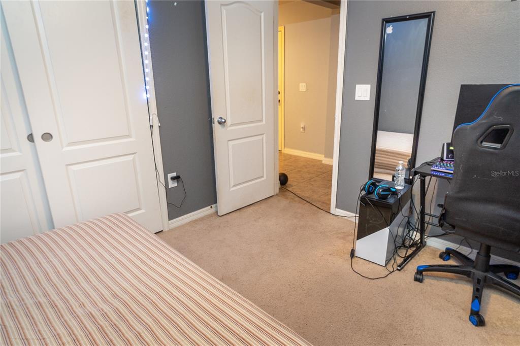 4563 Orchard Grove Road St. Cloud, FL 34772 - Photo 43 of 51 a view of a room with gym equipment
