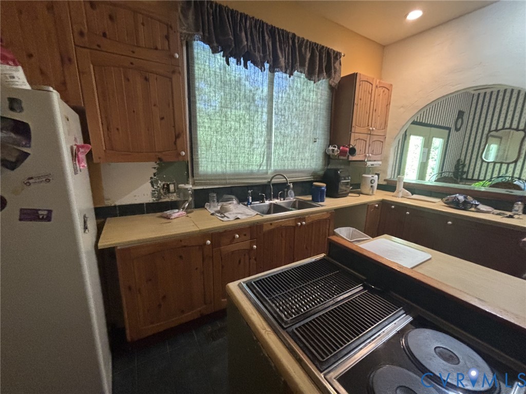 6424 Hackney Circle North Chesterfield, VA 23832 - Photo 12 of 23 a kitchen with a sink and a stove top oven