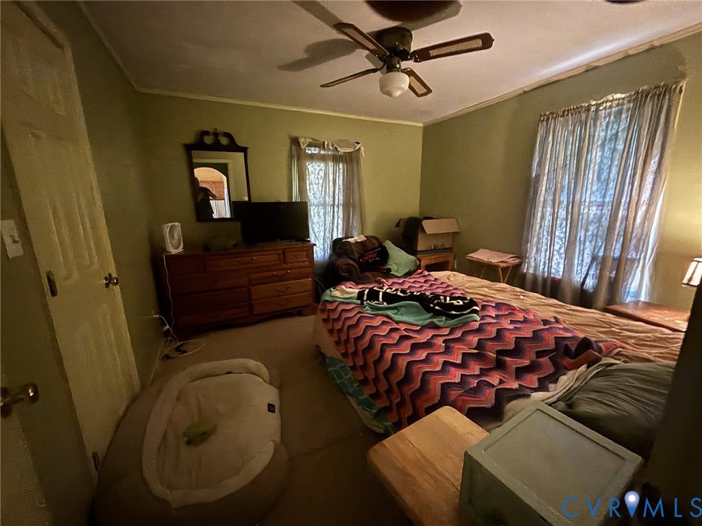 6424 Hackney Circle North Chesterfield, VA 23832 - Photo 14 of 23 a bedroom with a bed and wooden floor