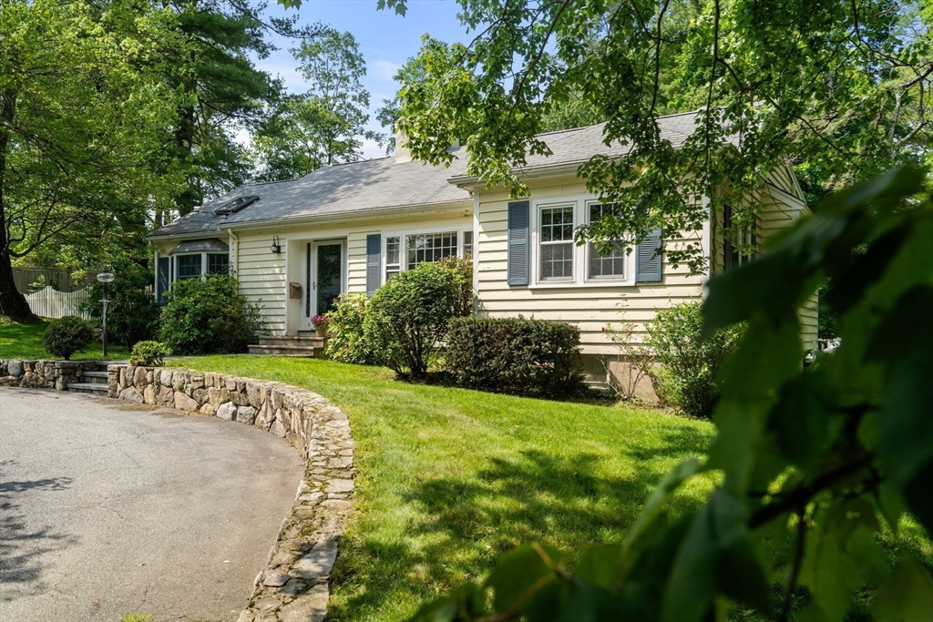 61 Conant Road Westwood, MA 02090 - Photo 2 of 12 a front view of house with yard and green space