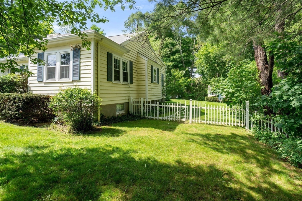 61 Conant Road Westwood, MA 02090 - Photo 10 of 12 a view of a house with a backyard and deck