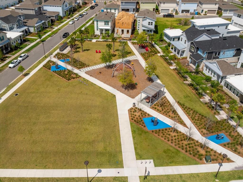 48 Florey Way Orlando, FL 32827 - Photo 2 of 25 a view of a city with tall buildings