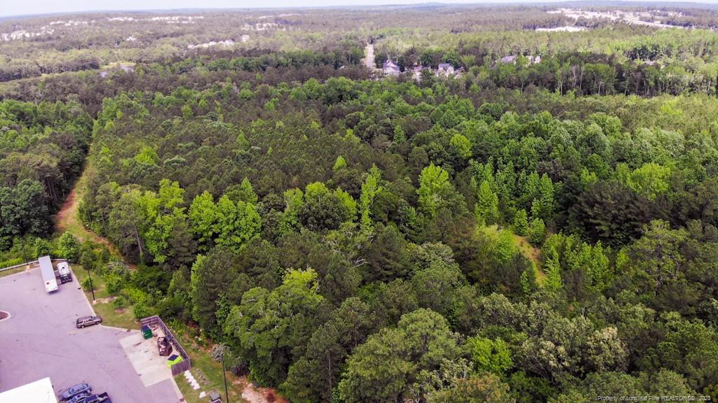 24-87 Nc Cameron, NC 28326 - Photo 11 of 28 an aerial view of a houses with a yard