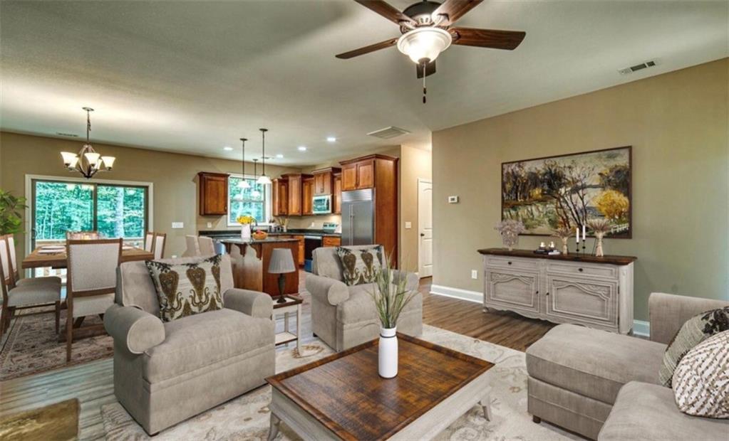 199 Lola Mae Way Morganton, GA 30560 - Photo 6 of 39 a living room with furniture kitchen view and a large window