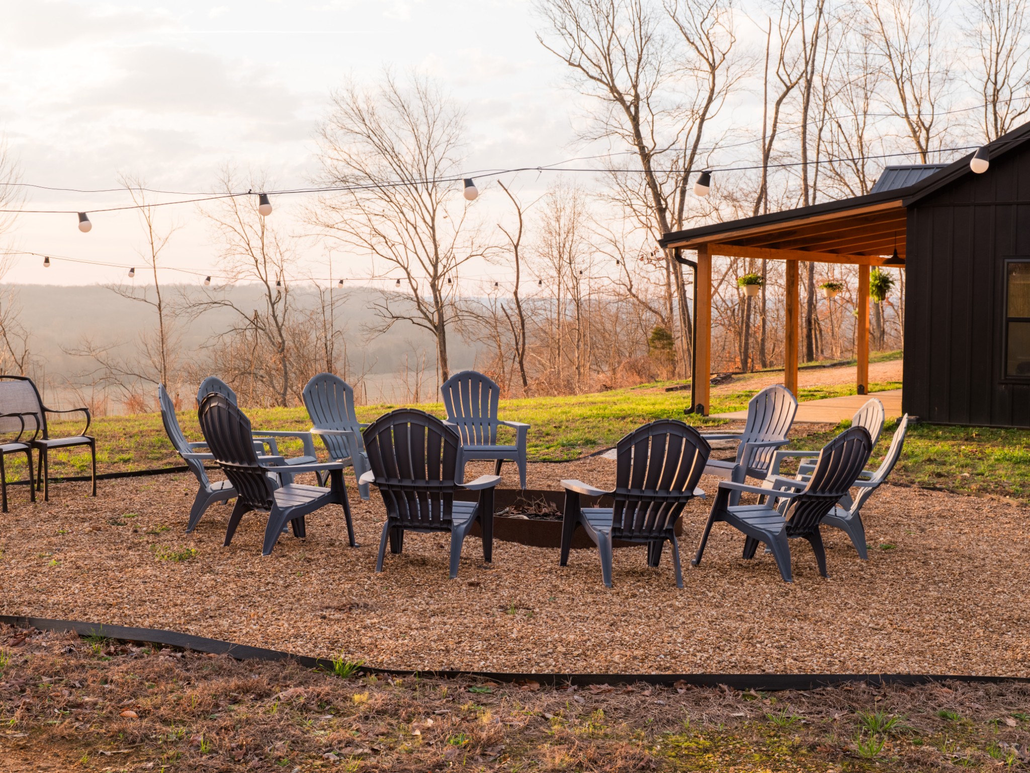 7050 Bakerville Road Waverly, TN 37185 - Photo 14 of 53 a view of a lake with table and chairs