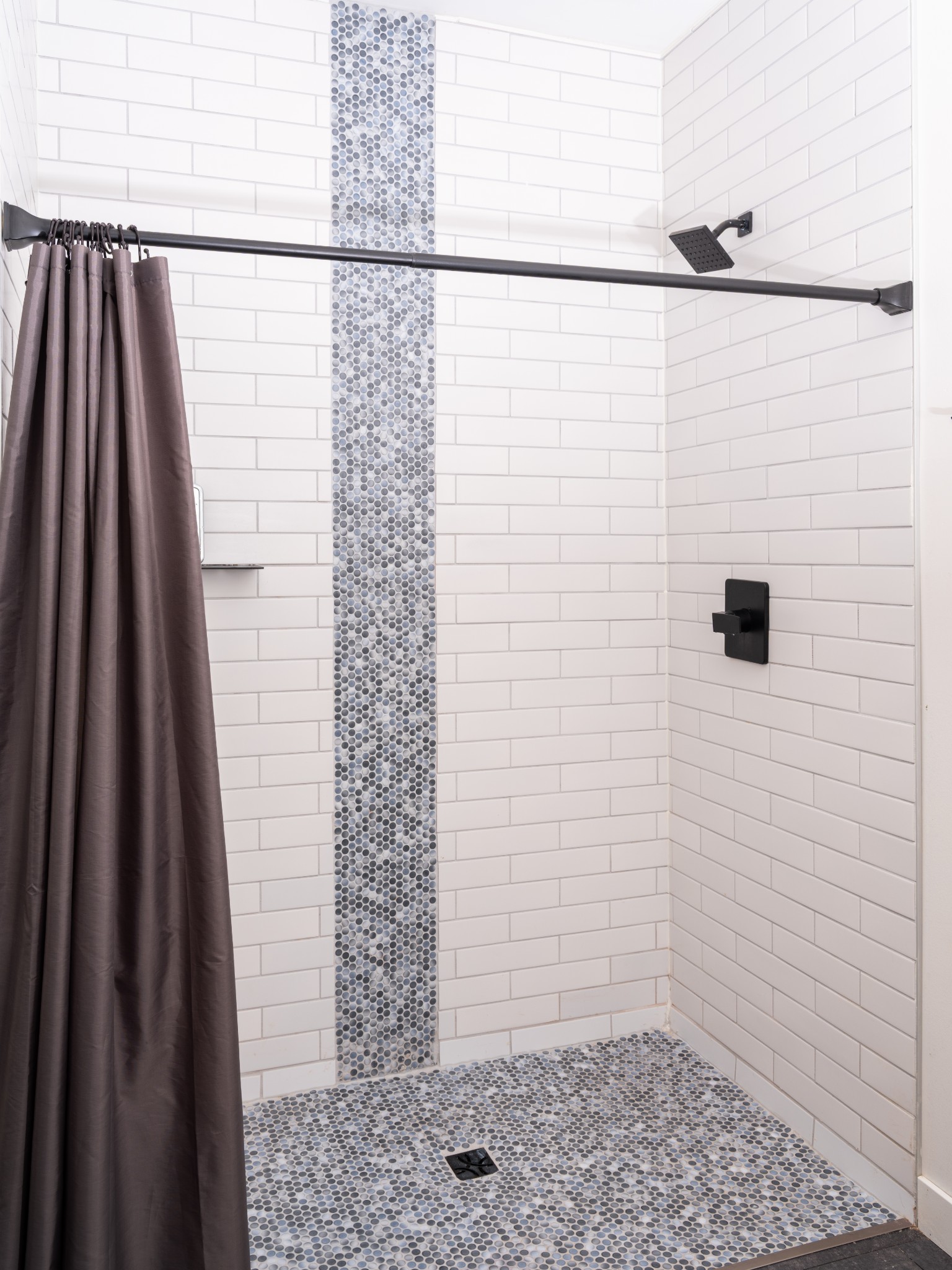 7050 Bakerville Road Waverly, TN 37185 - Photo 28 of 53 a bathroom with a shower