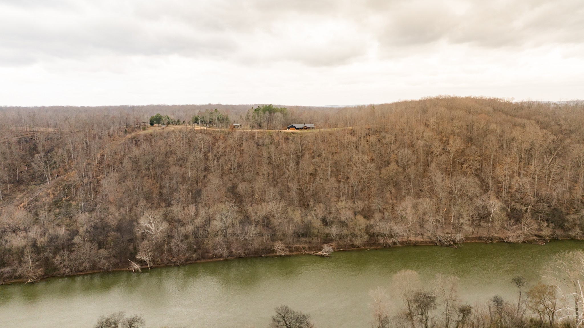 7050 Bakerville Road Waverly, TN 37185 - Photo 6 of 53 an aerial view of residential house with outdoor space and trees