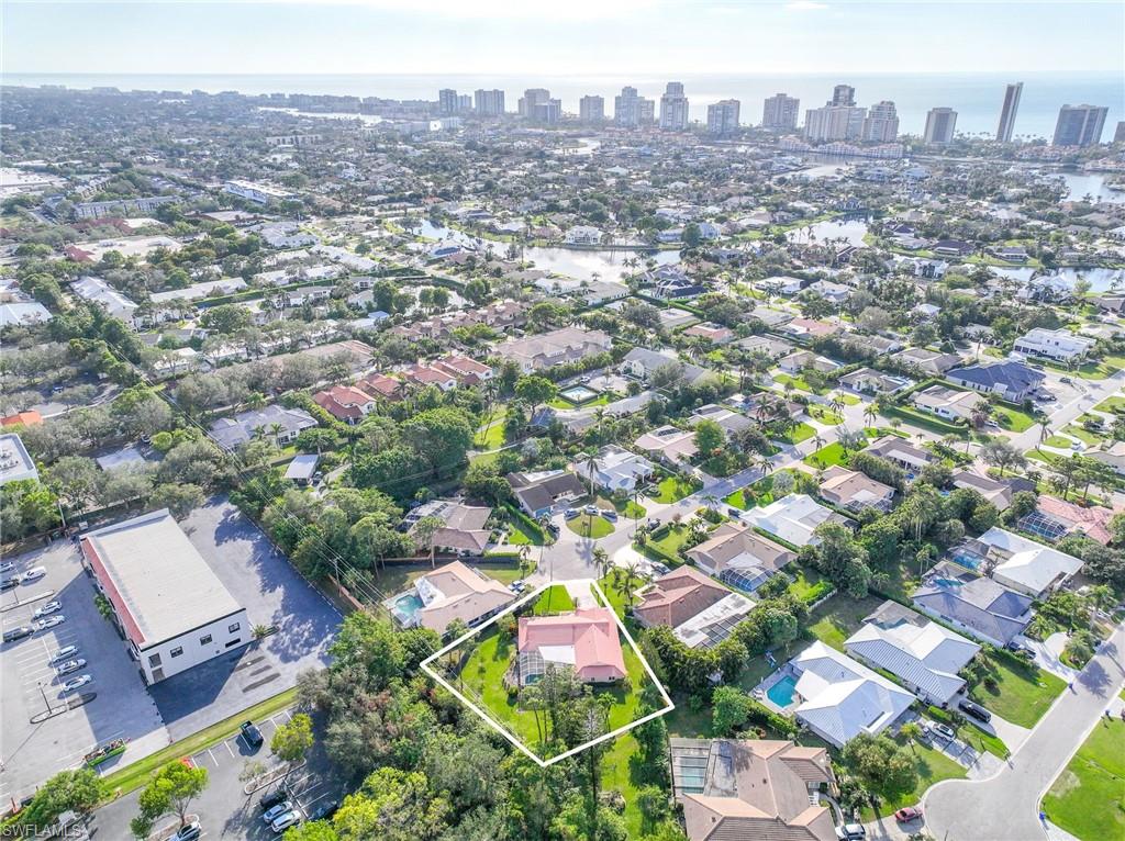 775 Southern Pines Drive Naples, FL 34103 - Photo 2 of 7 an aerial view of residential houses with yard