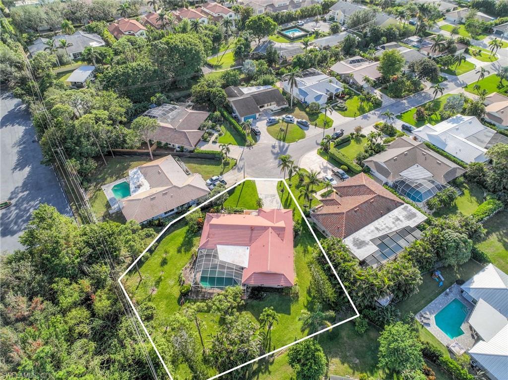 775 Southern Pines Drive Naples, FL 34103 - Photo 5 of 7 an aerial view of residential house with outdoor space and swimming pool