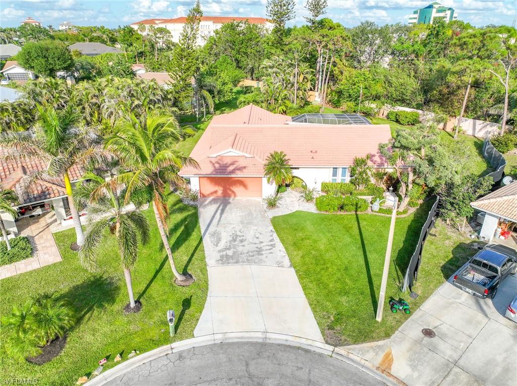 775 Southern Pines Drive Naples, FL 34103 - Photo 6 of 7 a view of a yard