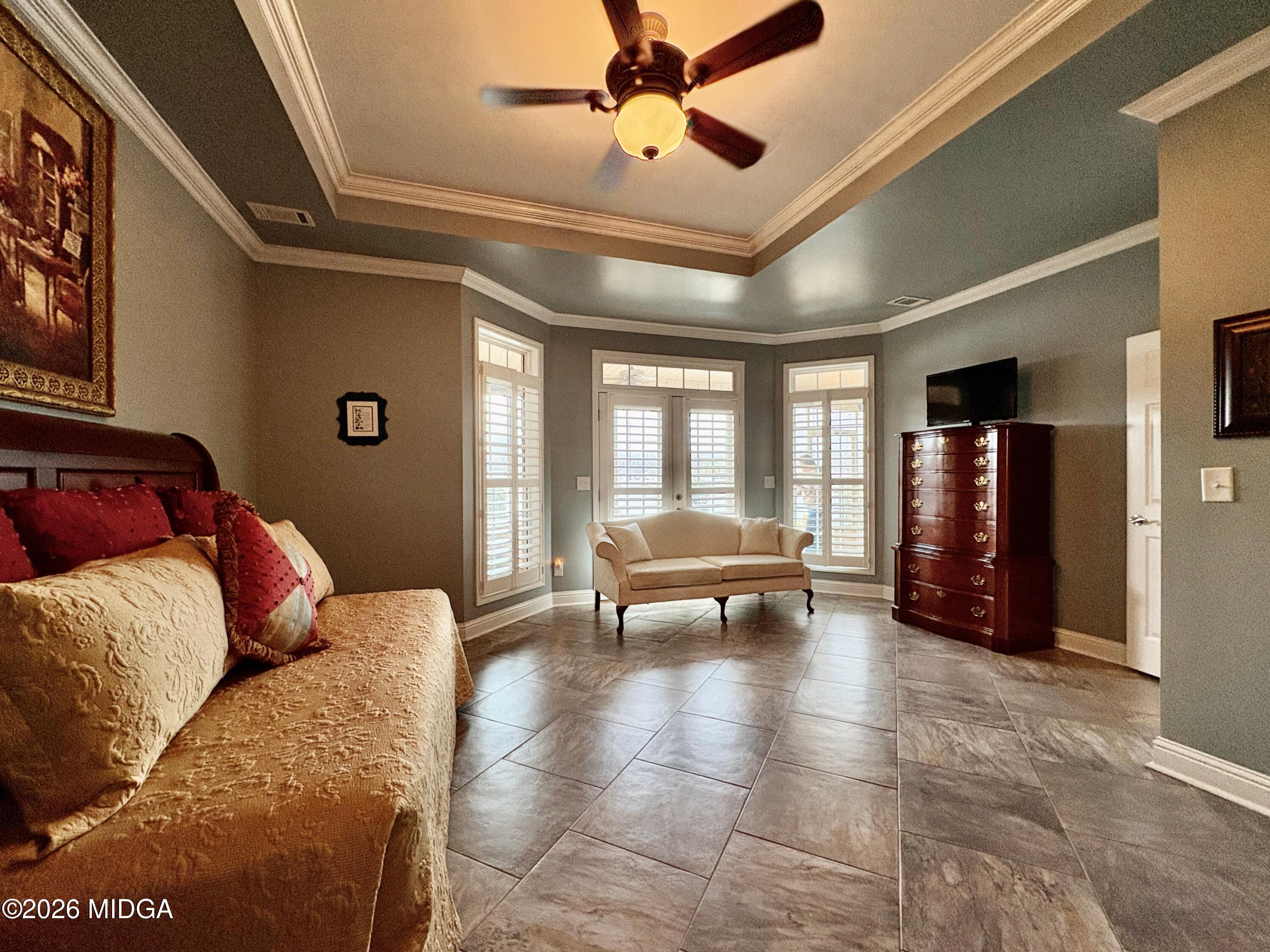 119 Bartlett Way Centerville, GA 31028 - Photo 15 of 48 a living room with furniture and a chandelier