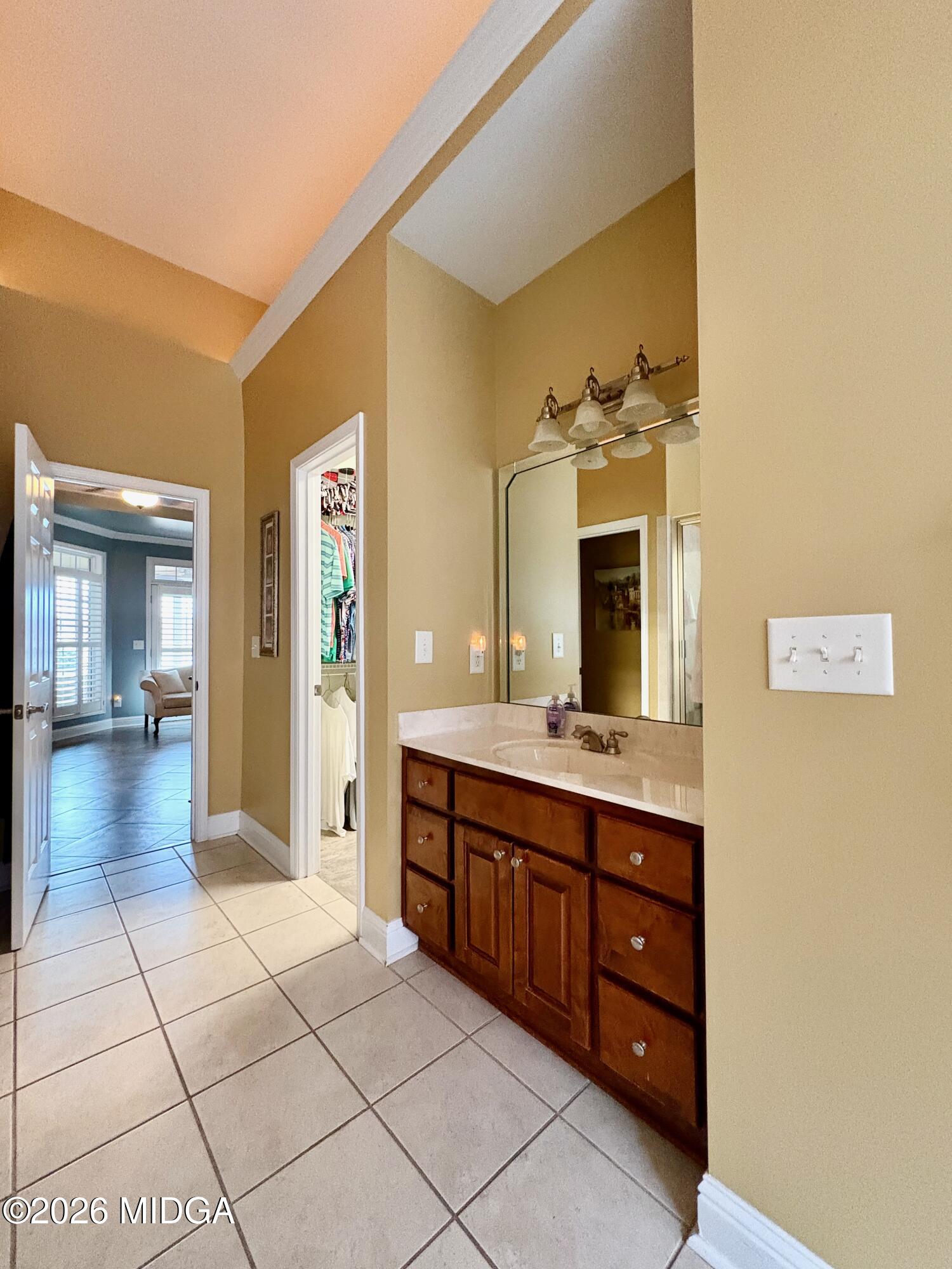119 Bartlett Way Centerville, GA 31028 - Photo 19 of 48 a spacious bathroom with a granite countertop sink mirror and bathtub