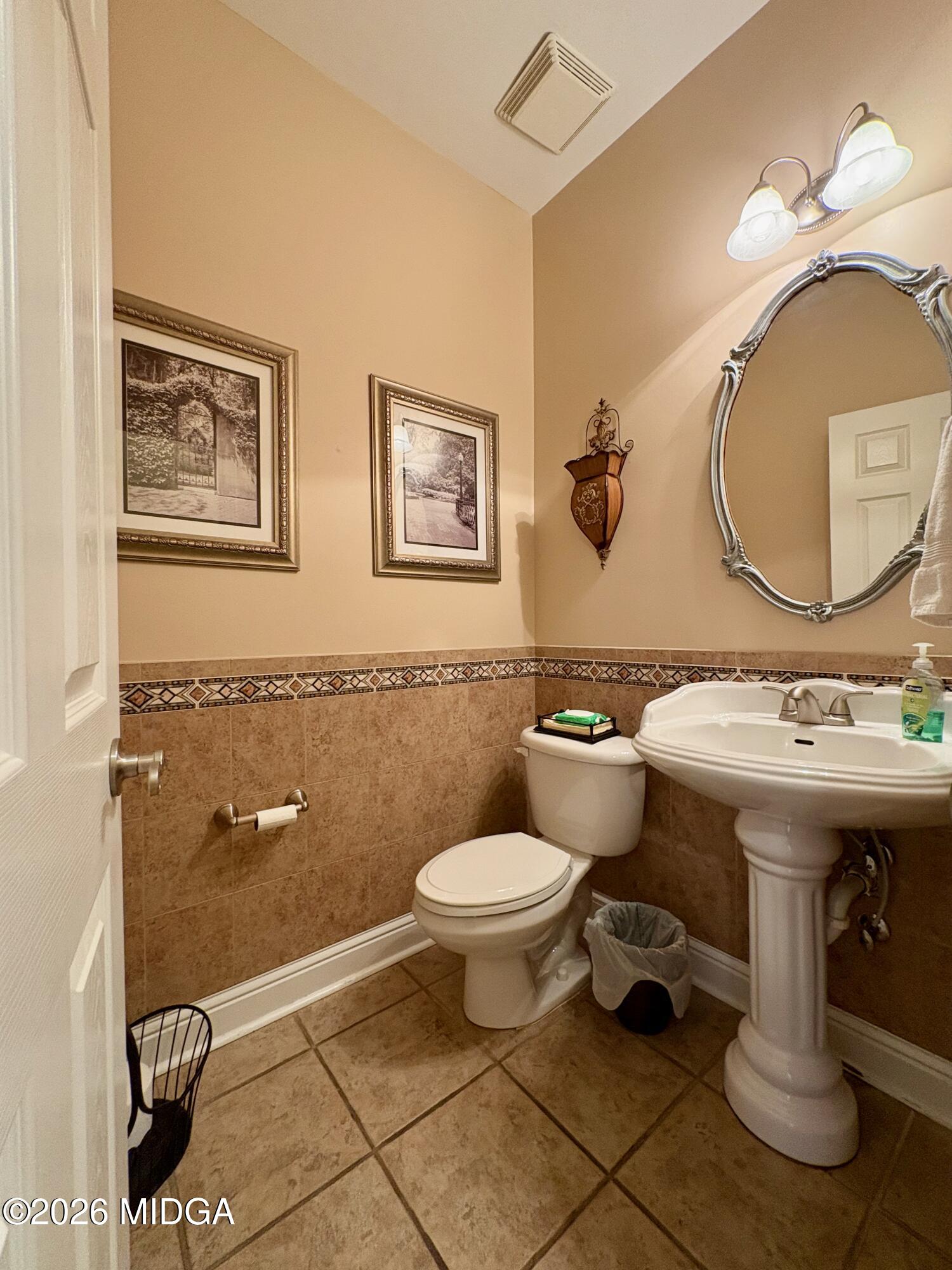 119 Bartlett Way Centerville, GA 31028 - Photo 23 of 48 a bathroom with a sink mirror and toilet