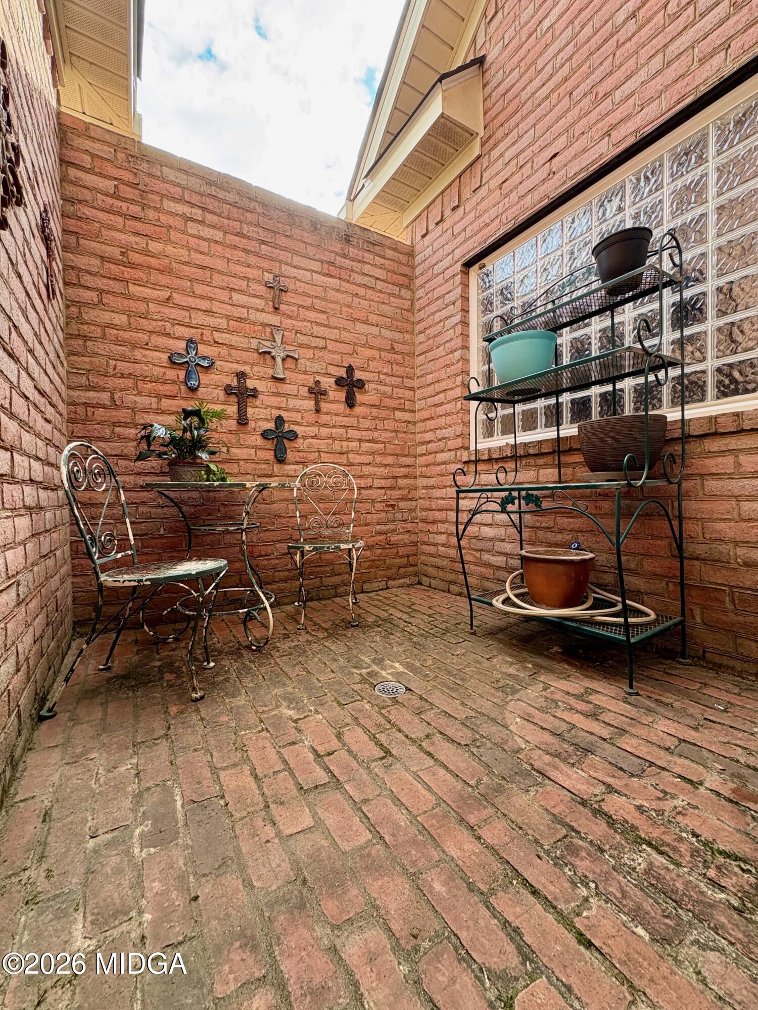 119 Bartlett Way Centerville, GA 31028 - Photo 25 of 48 a view of a patio with table and chairs with wooden floor