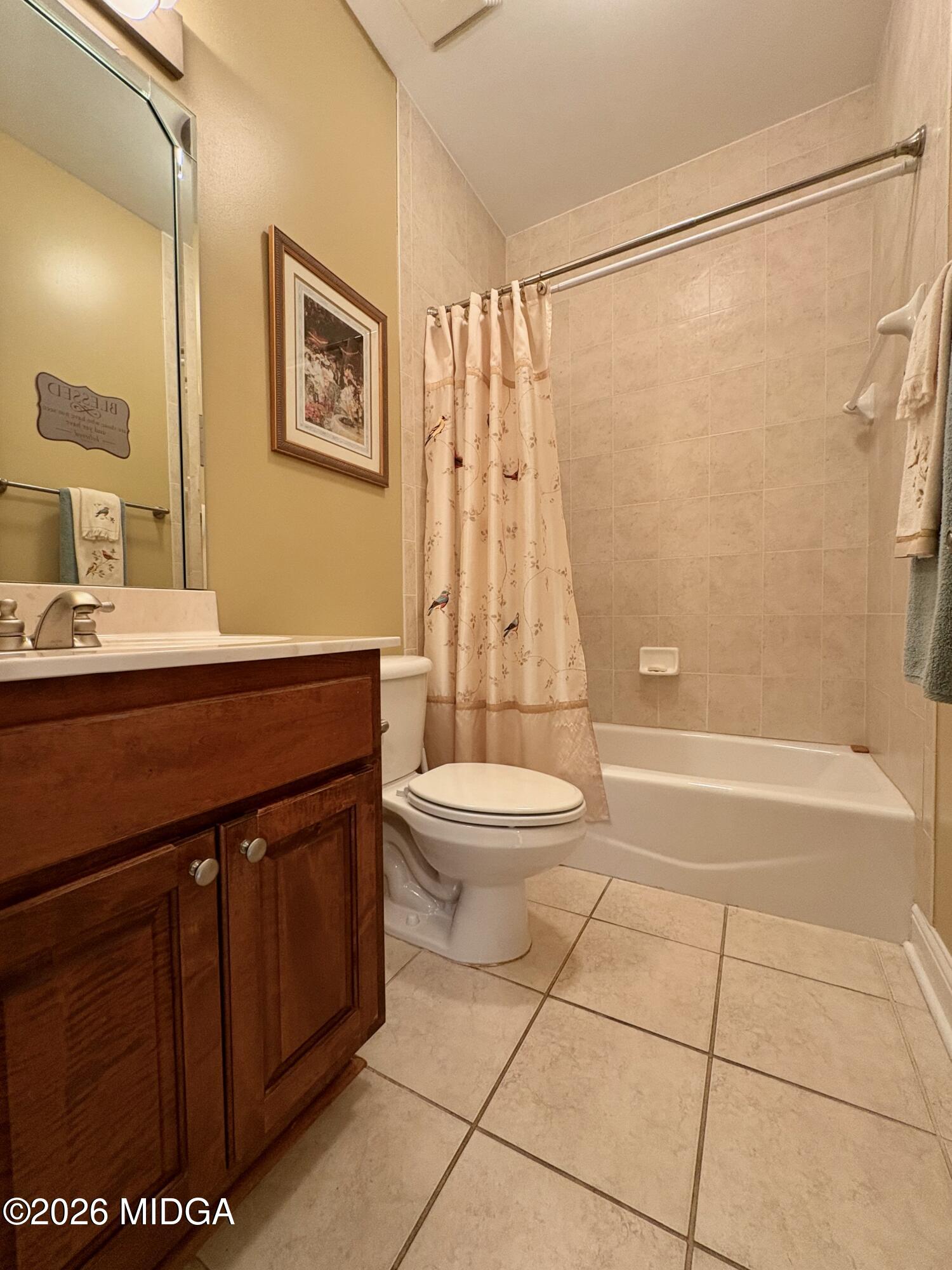 119 Bartlett Way Centerville, GA 31028 - Photo 27 of 48 a bathroom with a sink a toilet and shower
