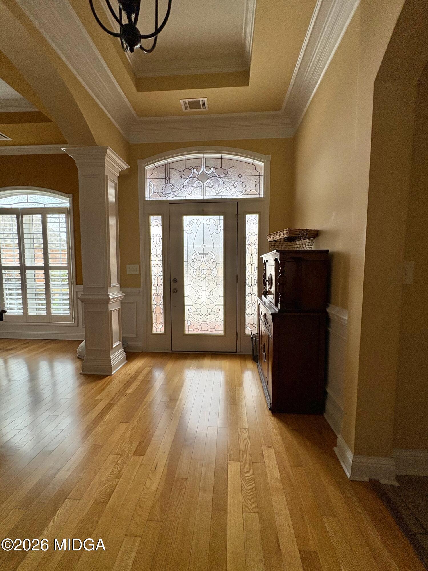 119 Bartlett Way Centerville, GA 31028 - Photo 3 of 48 a view of an empty room with wooden floor and a window