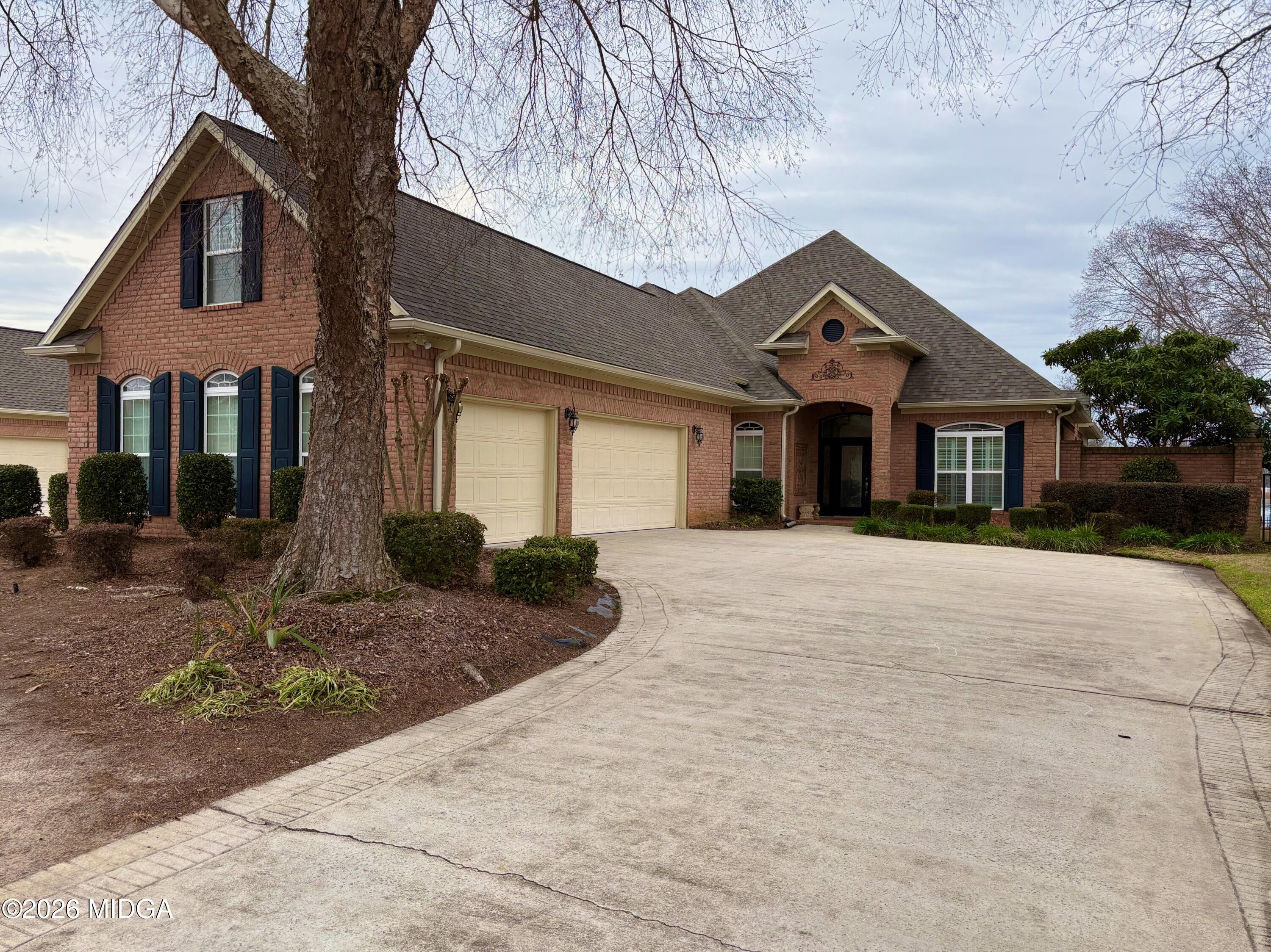 119 Bartlett Way Centerville, GA 31028 - Photo 46 of 48 a front view of a house with yard and tress