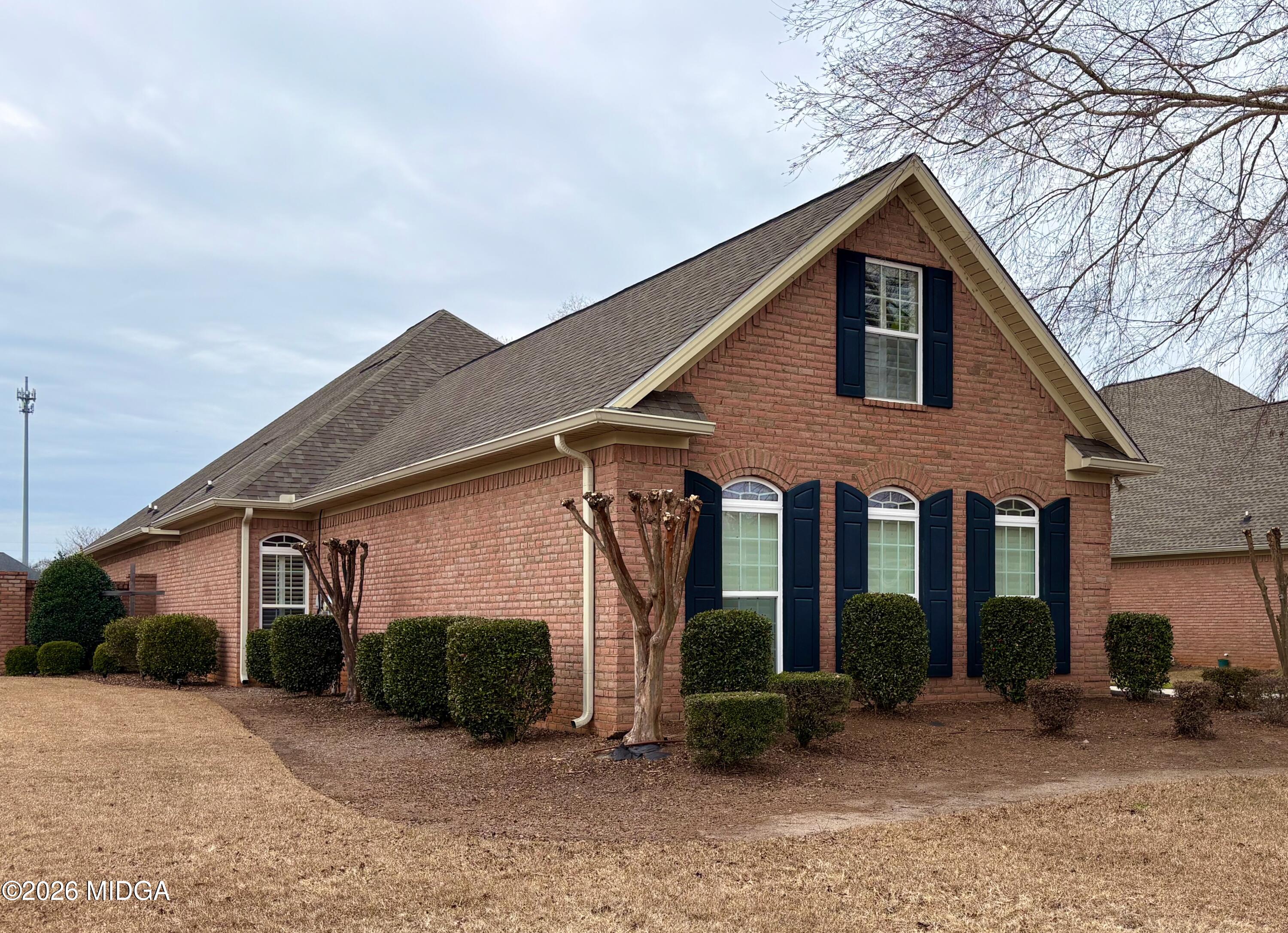 119 Bartlett Way Centerville, GA 31028 - Photo 47 of 48 a front view of a house with garden