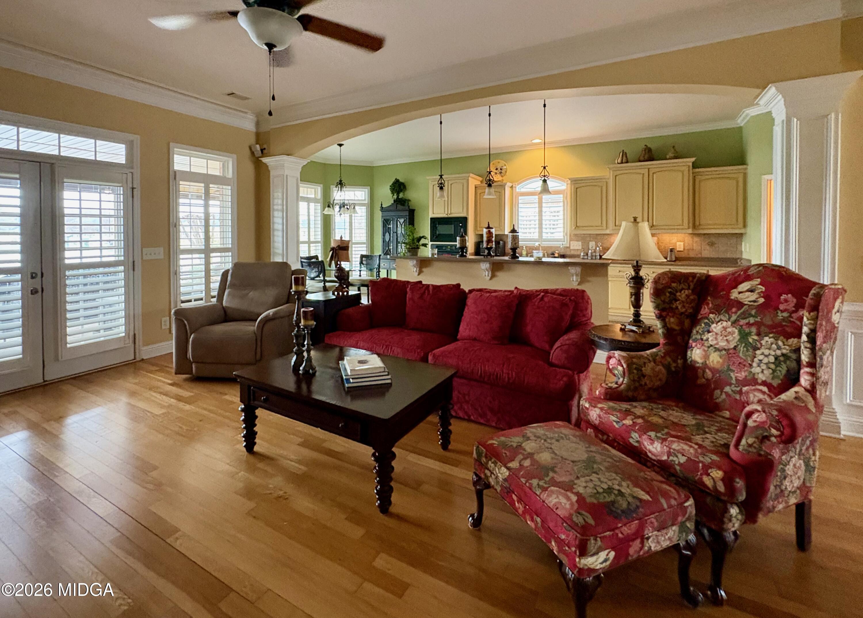 119 Bartlett Way Centerville, GA 31028 - Photo 8 of 48 a living room with furniture and a wooden floor