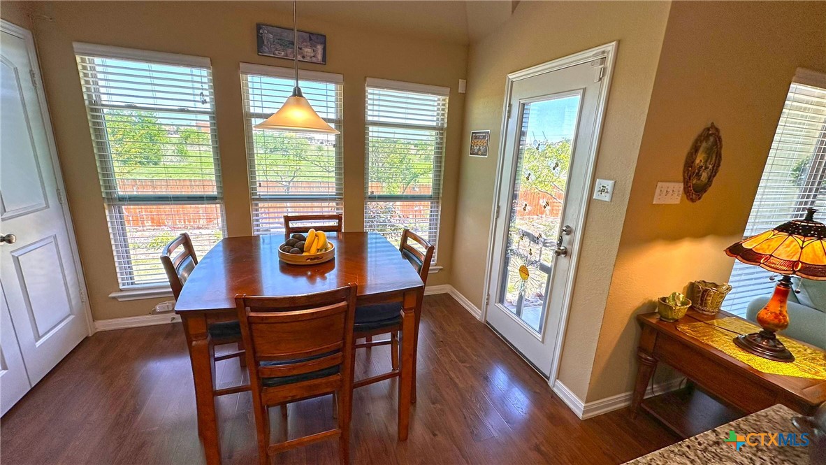 4709 Farrell Lane Killeen, TX 76549 - Photo 11 of 30 a view of a dining room with furniture window and wooden floor