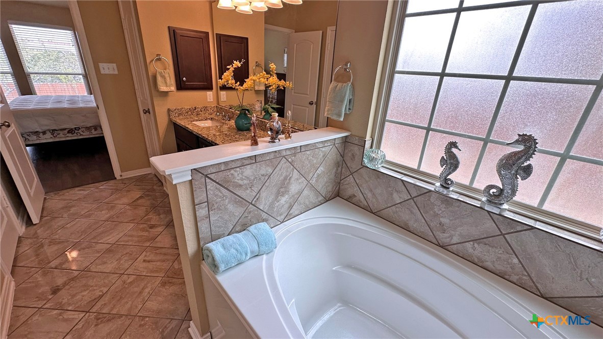 4709 Farrell Lane Killeen, TX 76549 - Photo 18 of 30 a view of living room with furniture and a fireplace
