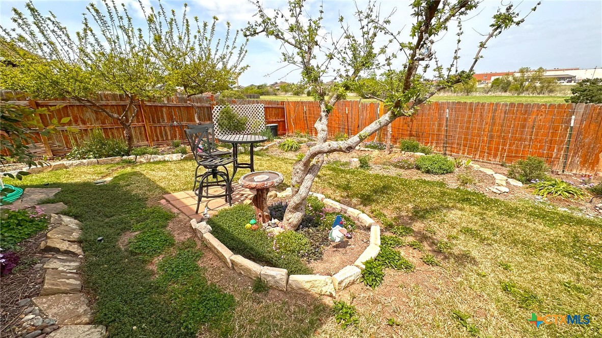4709 Farrell Lane Killeen, TX 76549 - Photo 30 of 30 a view of a swimming pool with a patio and a yard