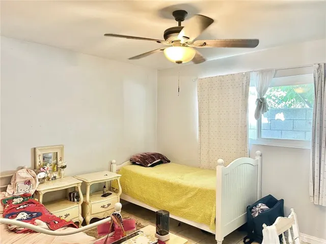 a swimming pool with outdoor seating and yard