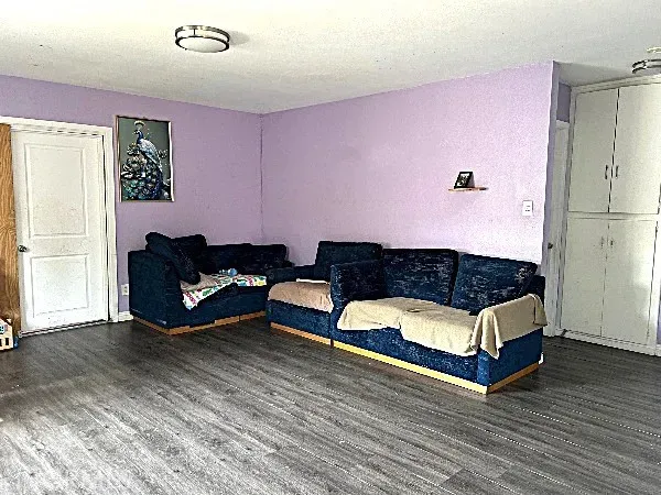 a kitchen with a refrigerator and a stove