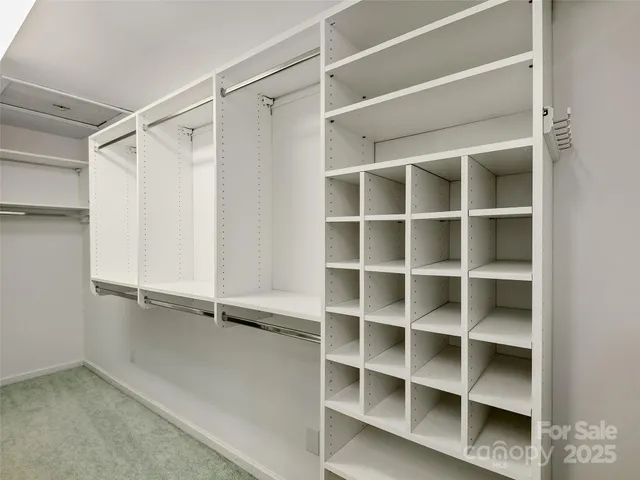 a view of an empty walk in closet