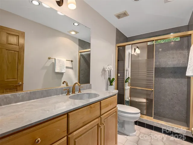 a bed room with a bed and a couch