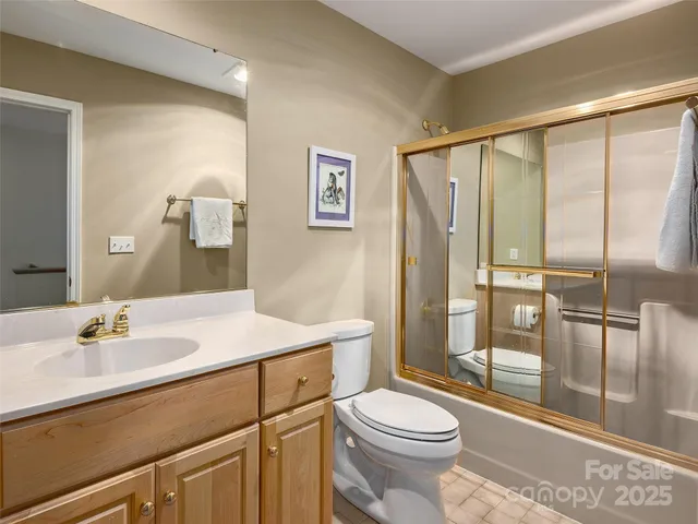 a bedroom with a bed and a fireplace