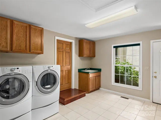 a view of a large room with wooden floor