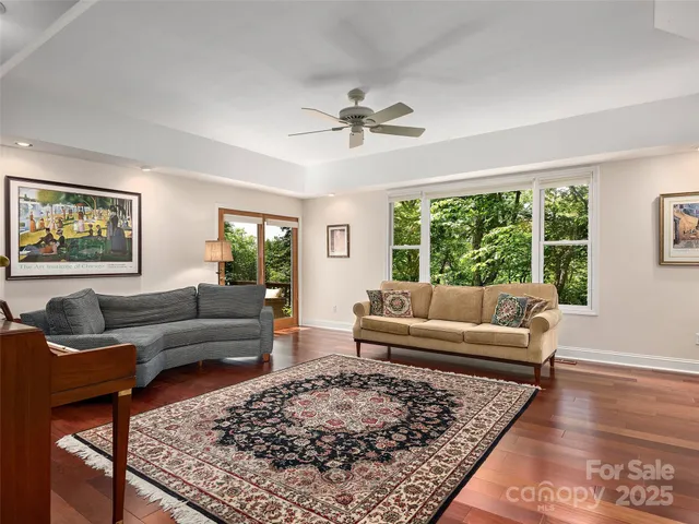a living room with furniture and a rug