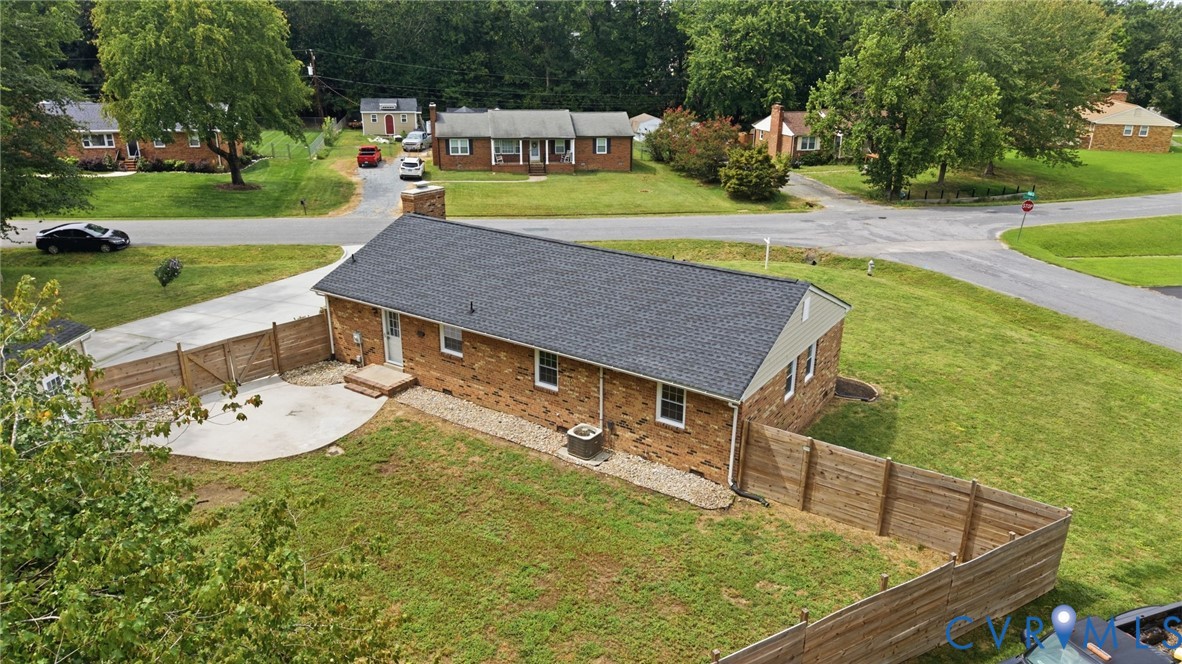3221 Clintwood Road Midlothian, VA 23112 - Photo 44 of 46 Brick exterior with a dark shingle roof, featuring